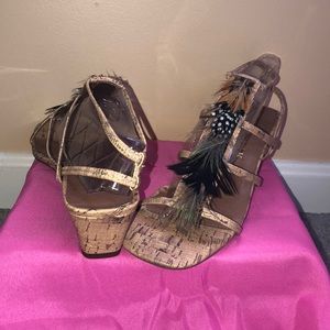 Tribal sandals with feather accents